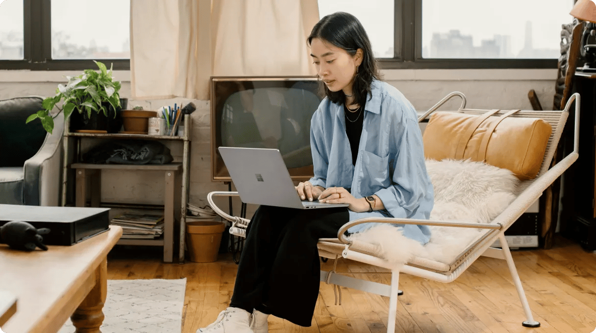 A Woman Working Remotely On A Laptop