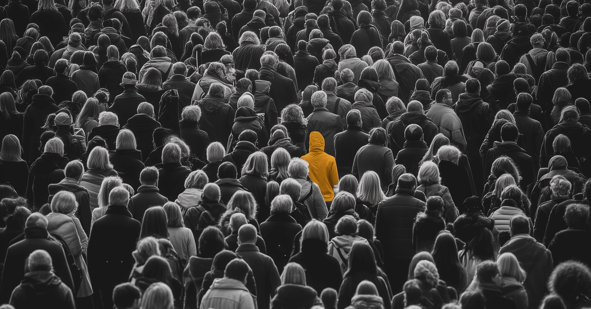 Person Standing Out In Crowd