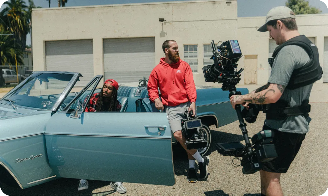 Filming Scene With Classic Car And Crew